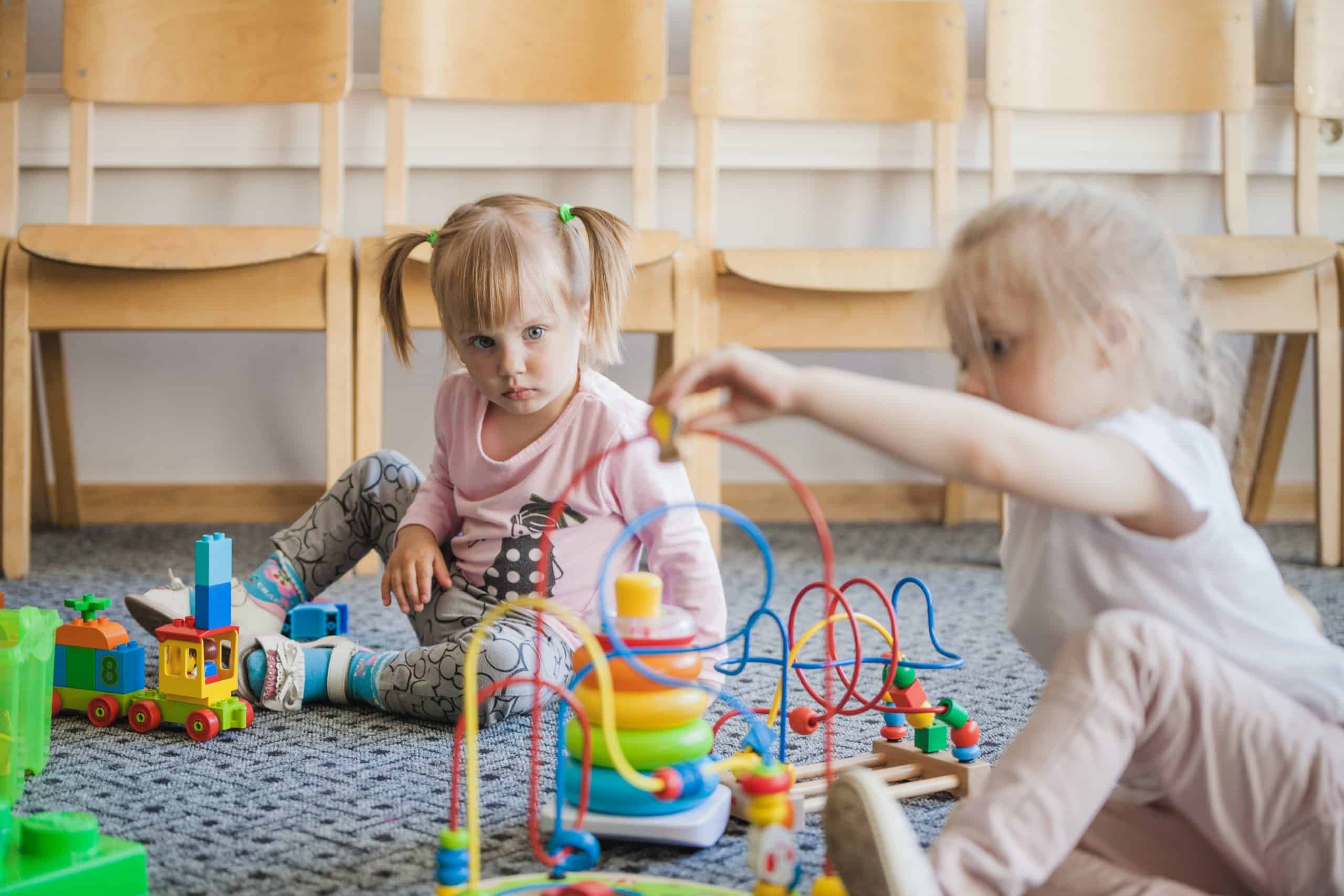 children kindergarten with toys